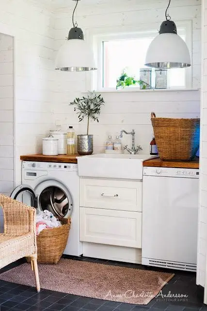 Love the sink in this small laundry room!  Very rustic and farmhouse feel to it.